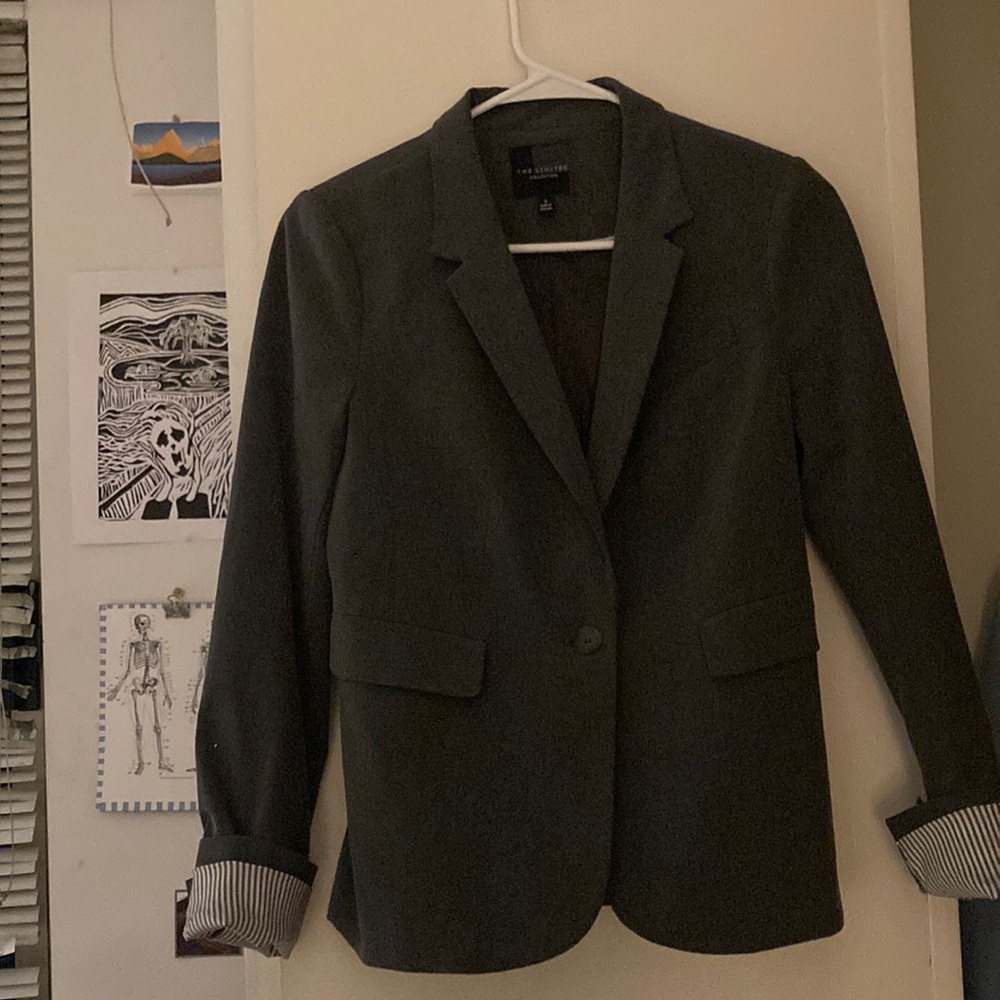 Grey blazer with blue striped cuffs